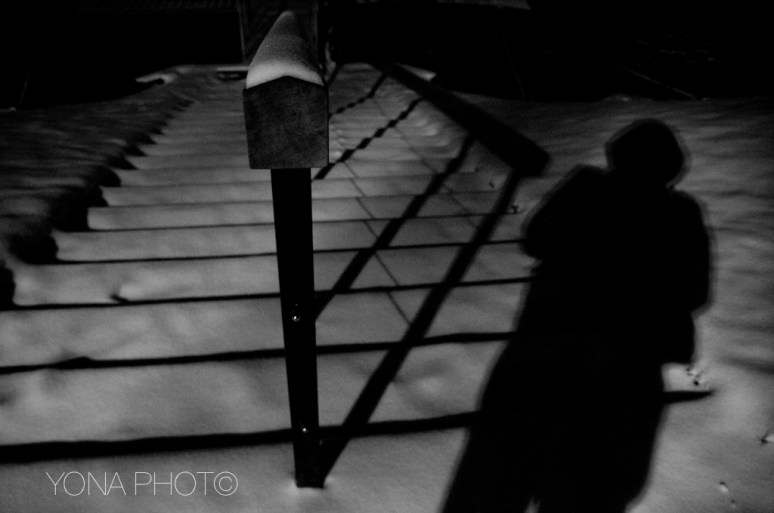 Shadows in the snow show staircases down below