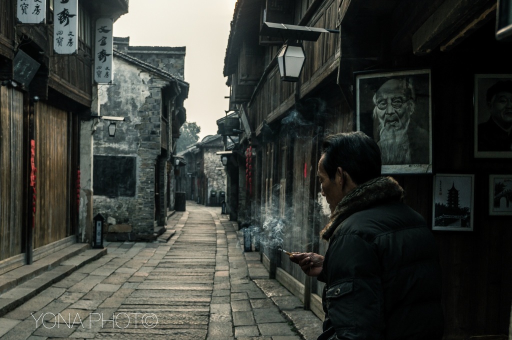 Smoking man in the streeds of WuZhen
